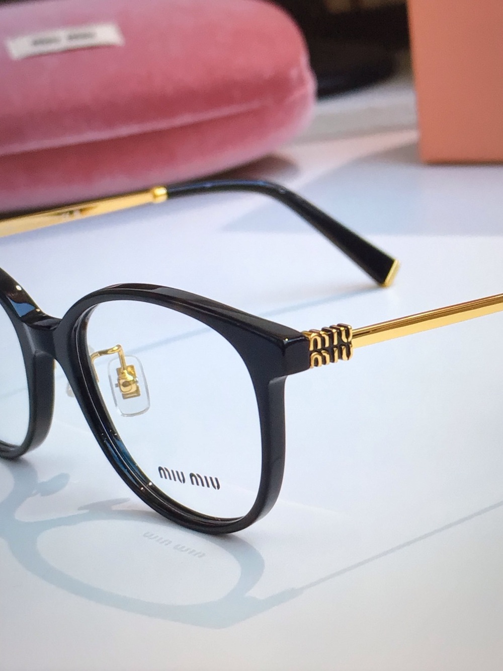 Miu Miu Black and Gold Round Women's Eyeglasses - Picture 2 of 4